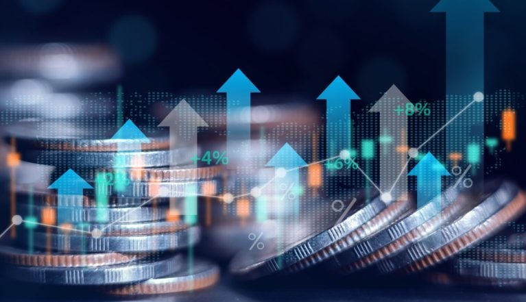 Business finance and investment concept, Capital gain world money economic growth. coin stack financial graph chart, market report on cash currency concept.